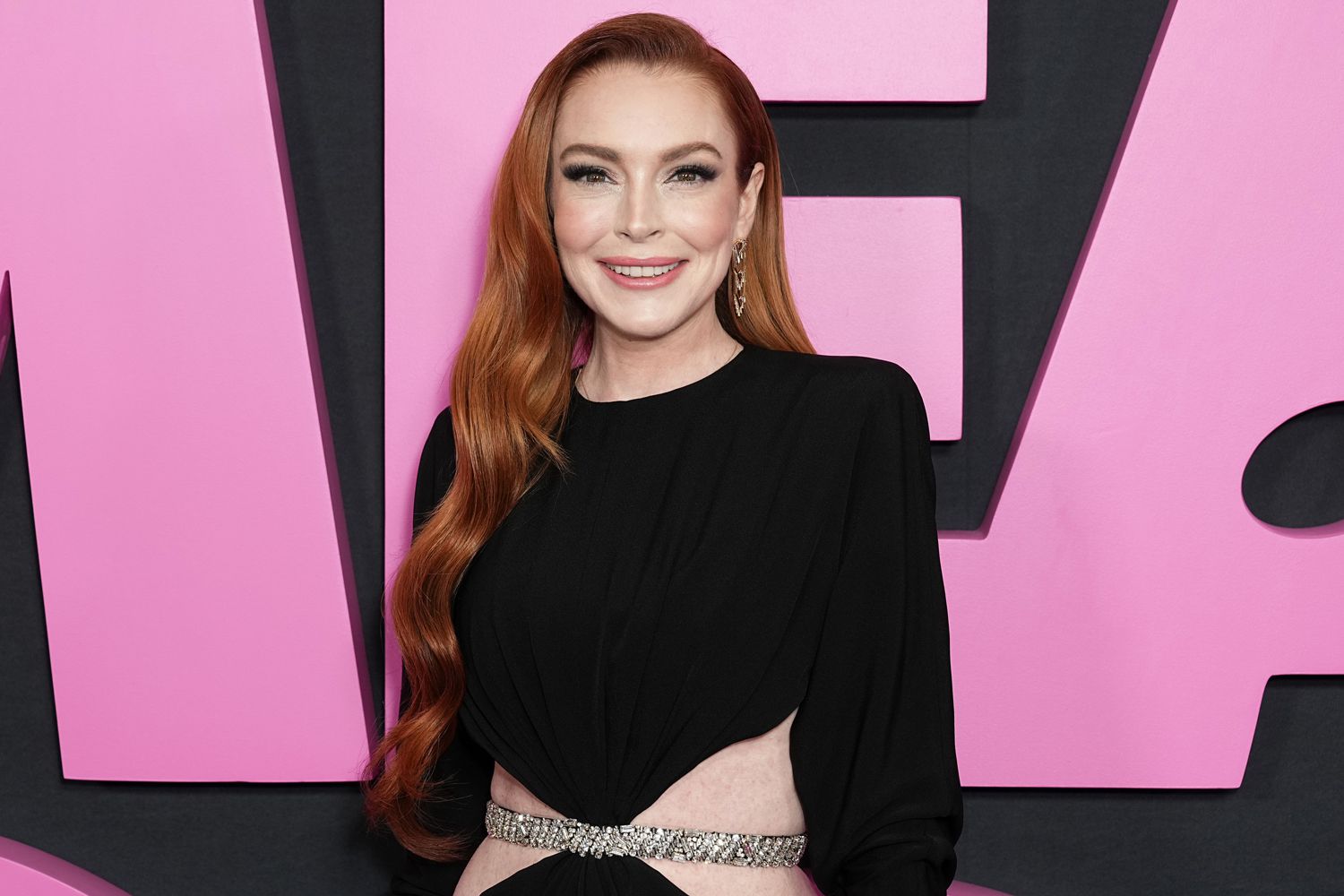 Lindsay Lohan Wows in Red Carpet Return at "Mean Girls" Premiere