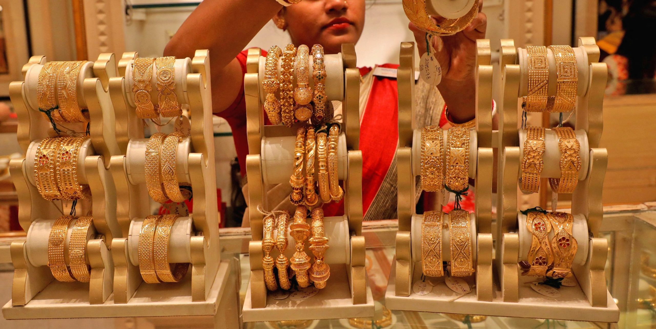 Indian Gold Dealers Navigate High Prices and Tax Speculations Amid Demand Fluctuations