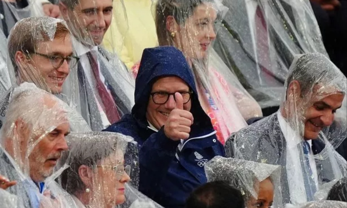 Keir Starmer Dismisses Buzz Over Poncho-Free Appearance at Rainy Paris Olympics